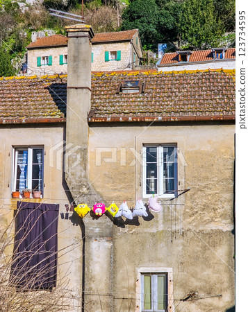 Kotor's Colour: Laundry on a Balcony Among Cobblestone Streets. Kotor's Colour: Laundry on a Balcony Among Cobblestone Streets. 123734595