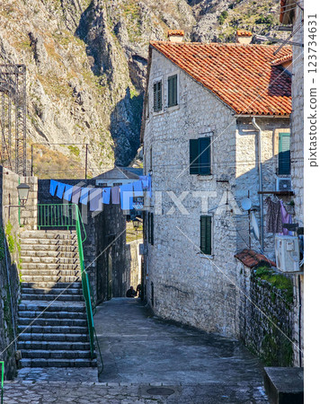 Kotor's Colour: Laundry on a Balcony Among Cobblestone Streets. Kotor's Colour: Laundry on a Balcony Among Cobblestone Streets. 123734631