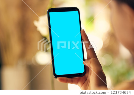 Green screen phone, mockup and hands on mobile app for advertising, brand and marketing space. Woman, online technology and social media, website network and multimedia web design internet connection Green screen phone, mockup and hands on mobile app for advertising, brand and marketing space. Woman, online technology and social media, website network and multimedia web design internet connection 123734654