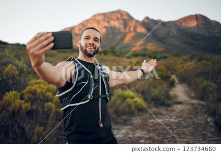 Selfie, athlete and man with smartphone in nature on trail smile, happy and healthy doing exercise and workout. Fitness influencer, health or wellness outdoor calm, peaceful or while training outdoor Selfie, athlete and man with smartphone in nature on trail smile, happy and healthy doing exercise and workout. Fitness influencer, health or wellness outdoor calm, peaceful or while training outdoor 123734680