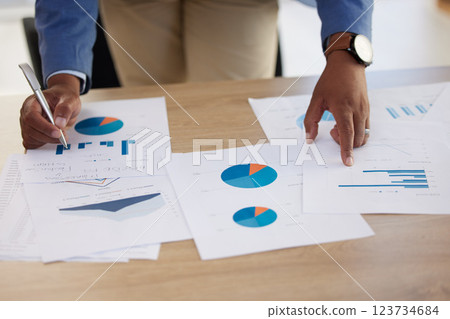 Businessman hands, paperwork graphs and planning annual report, data analyst research and office budget. Closeup chart documents, strategy and analytics progress, financial economy and stats review 123734684