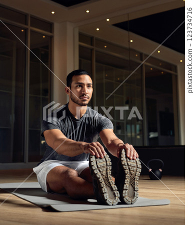 Fitness, man and stretching legs in gym for health, body wellness and workout preparation. Warm up muscle, flexibility and exercise to start training, sport and getting ready for practice at night Fitness, man and stretching legs in gym for health, body wellness and workout preparation. Warm up muscle, flexibility and exercise to start training, sport and getting ready for practice at night 123734716