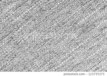 White Jacquard fabric with large loose diagonal woven, coarse weave texture background White Jacquard fabric with large loose diagonal woven, coarse weave texture background 123735373