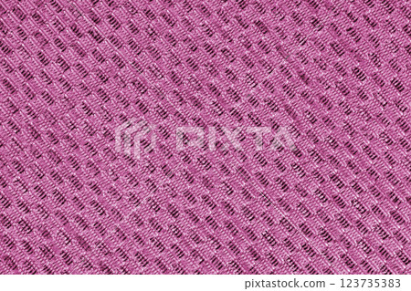 Close up sturcture, texture of pink jacquard fabric with diagonal rough weave background Close up sturcture, texture of pink jacquard fabric with diagonal rough weave background 123735383