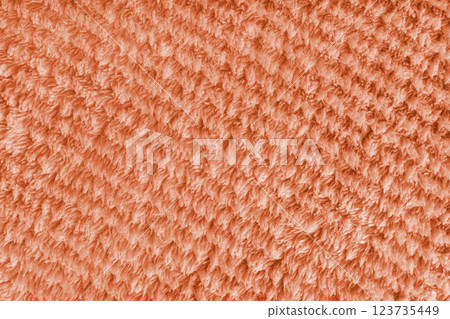Terry cloth, diagonal stirped orange towel texture. Soft textile bath, beach microfiber material Terry cloth, diagonal stirped orange towel texture. Soft textile bath, beach microfiber material 123735449