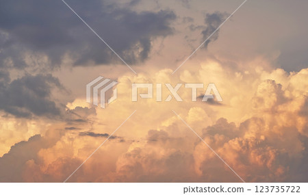 Orange clouds on evening sky during sunset 123735722