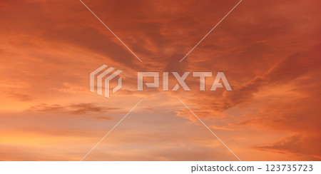 Orange and pink sky after sunset, nice clouds background 123735723