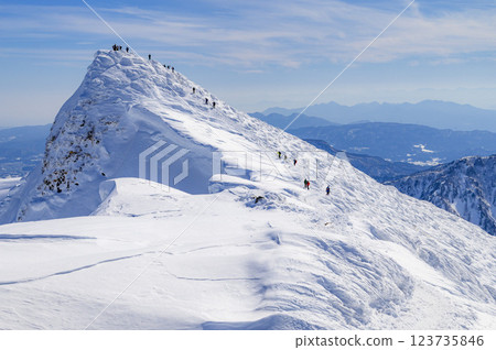 People climbing Mt. Tanigawa and Mt. Tomanomimi in the harsh winter People climbing Mt. Tanigawa and Mt. Tomanomimi in the harsh winter 123735846
