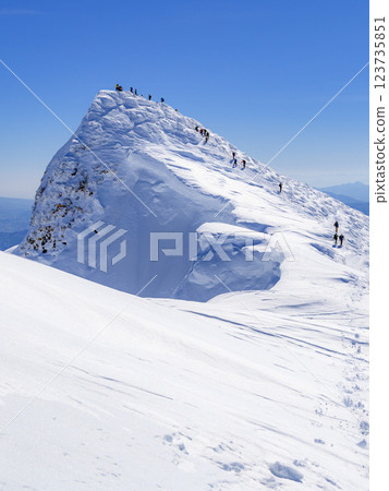 People climbing Mt. Tanigawa and Mt. Tomanomimi in the harsh winter People climbing Mt. Tanigawa and Mt. Tomanomimi in the harsh winter 123735851
