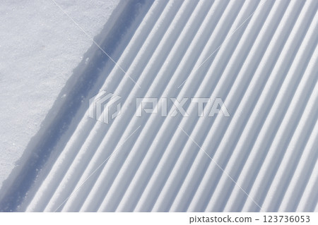 Lines left on the snow at a ski resort Lines left on the snow at a ski resort 123736053