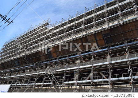 Scaffolding installed at construction site 123736095