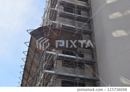 Scaffolding installed at construction site 123736098