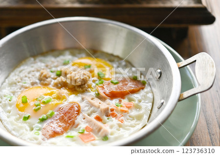 Pan-fried eggs with side dishes. Thai food, Vietnamese style.. 123736310