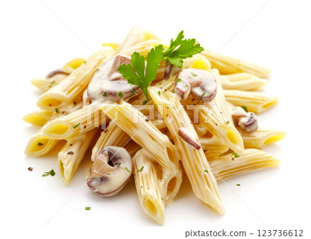 Plate of creamy penne pasta with mushrooms and fresh parsley is presented against, isolated on white background 123736612