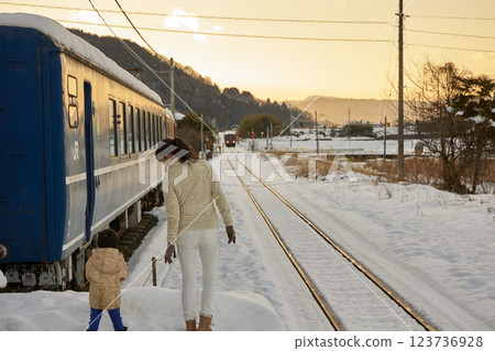 Sunset Station and Parents and Children Sunset Station and Parents and Children 123736928