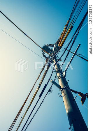 Electric wire protection cover and blue sky around the construction site b-3 Warm and cool colors 123738372