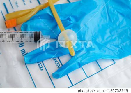 Foley catheter and urine drainage bag collect urine for disability or patient in hospital. 123738849
