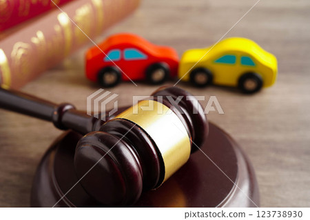 Car accident lawsuit and insurance, Judge hammer with car model. 123738930