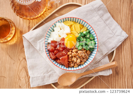 Bakudandon - A seafood bowl filled with sticky ingredients Bakudandon - A seafood bowl filled with sticky ingredients 123739624