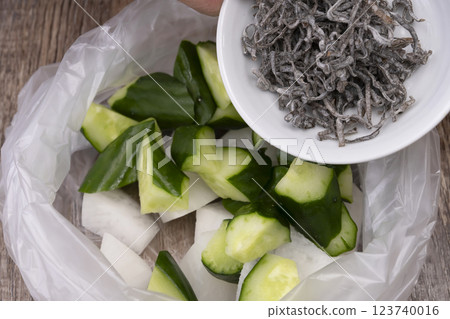The process of making lightly pickled radish and cucumber The process of making lightly pickled radish and cucumber 123740016