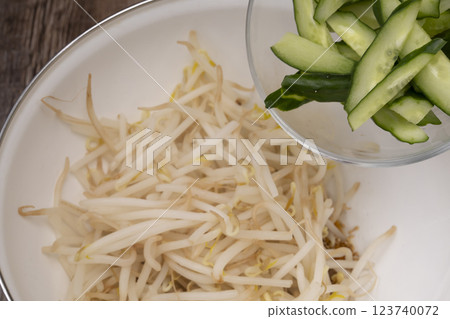 Steps for making bean sprout and cucumber namul Steps for making bean sprout and cucumber namul 123740072