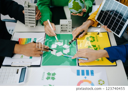 Green business company and Solar Energy Environment city Concept. business team people planning Green business company and Solar Energy Environment city Concept. business team people planning 123740455