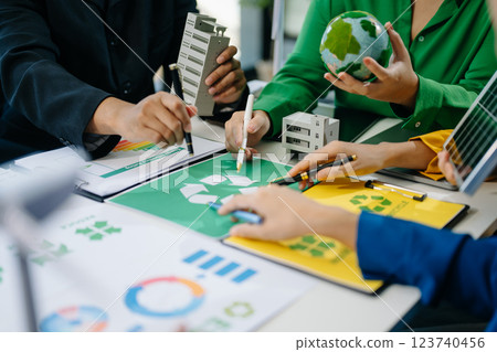 Green business company and Solar Energy Environment city Concept. business team people planning Green business company and Solar Energy Environment city Concept. business team people planning 123740456