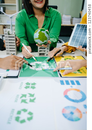 Green business company and Solar Energy Environment city Concept. business team people planning Green business company and Solar Energy Environment city Concept. business team people planning 123740458