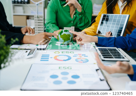 Green business company and Solar Energy Environment city Concept. business team people planning 123740465