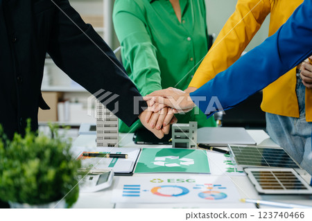 Green business company and Solar Energy Environment city Concept. business team people planning 123740466