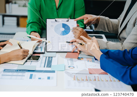 Business team collaboration discussing working analyzing with financial data and marketing growth report 123740470