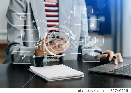 Digital marketing media in virtual screen.businesswoman hand working with mobile phone and modern compute Digital marketing media in virtual screen.businesswoman hand working with mobile phone and modern compute 123740506