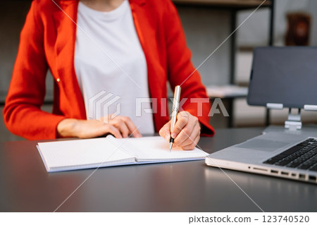 Businesswoman utilizing smartphone and tablet technology. Perfect for corporate, technology, 123740520