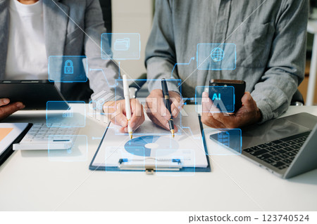 Working team meeting concept, business using laptop and smart phone and digital tablet computer Working team meeting concept, business using laptop and smart phone and digital tablet computer 123740524