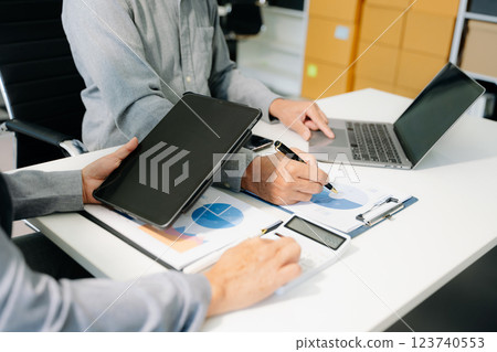 Business team meeting present.professional investor working with  Finance managers task 123740553