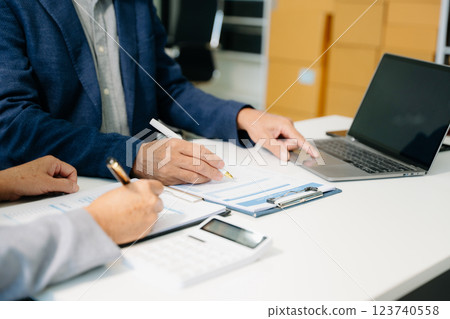 Business team meeting present.professional investor working with  Finance managers task 123740558