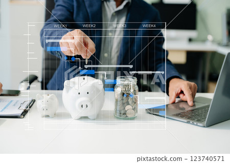 Save smart! Explore financial planning with coins, piggy banks, and digital tools. Perfect for savings, banking, Save smart! Explore financial planning with coins, piggy banks, and digital tools. Perfect for savings, banking, 123740571