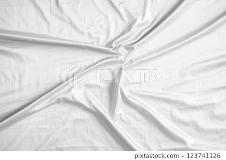 Abstract white wrinkled bedding sheet fabric texture background Abstract white wrinkled bedding sheet fabric texture background 123741126