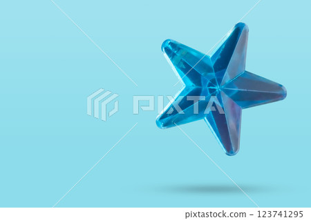 blue star jewels sticker isolated on blue background blue star jewels sticker isolated on blue background 123741295