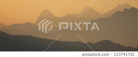 Mountains of the Bernese Oberland at sunrise, view from a place near Gstaad, Switzerland. Mountains of the Bernese Oberland at sunrise, view from a place near Gstaad, Switzerland. 123741782