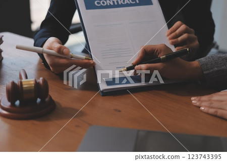 Judge gavel with Justice lawyers having team meeting at law firm background. Concepts of Law and Legal services. Judge gavel with Justice lawyers having team meeting at law firm background. Concepts of Law and Legal services. 123743395