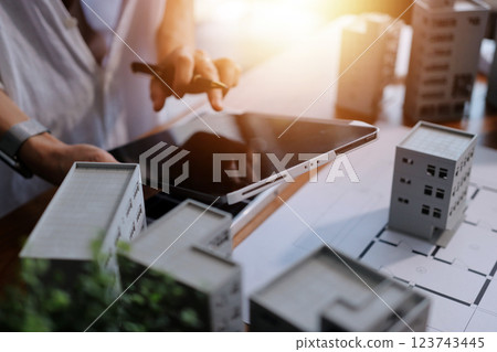 Discussion among businesspeople on the latest developments in solar cell panel technology and Solar Energy Environment city Concept. Discussion among businesspeople on the latest developments in solar cell panel technology and Solar Energy Environment city Concept. 123743445