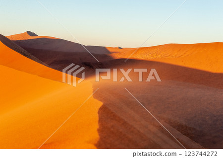 Climbing Dune 45 at sunrise 123744272