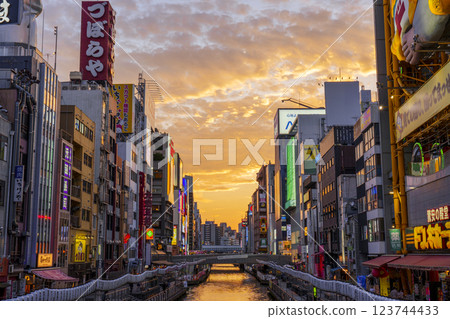 A wonderful evening view of Dotonbori in Minami, Osaka [from Tazaemonbashi Bridge] 123744433