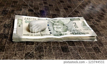 Bundle of Rs 500 Indian Currency kept on a wooden table 123744531