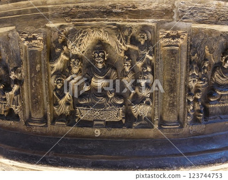A painting of Buddha preaching in the Thirty-Three Heavens, arranged around a small stupa on display at a museum in Lahore, the ancient city of Pakistan. A painting of Buddha preaching in the Thirty-Three Heavens, arranged around a small stupa on display at a museum in Lahore, the ancient city of Pakistan. 123744753