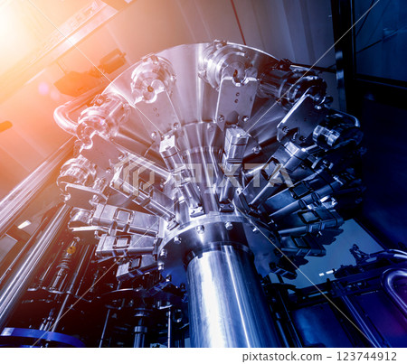 Automatic filling machine pours water into plastic PET bottles. Automatic filling machine pours water into plastic PET bottles. 123744912