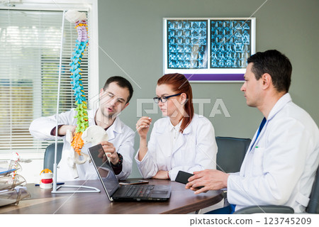 Doctors team having medical council in hospital.  123745209