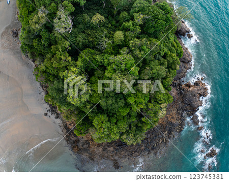 Bird eye view seashore with waves crashing on rock cliff,Beautiful waves sea surface in sunset time, Amazing seascape top view seacoast landscape view Bird eye view seashore with waves crashing on rock cliff,Beautiful waves sea surface in sunset time, Amazing seascape top view seacoast landscape view 123745381