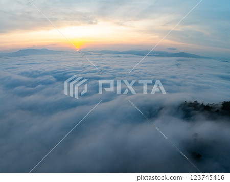 Drone aerial view of landscape fog over mountains in sunrise sky,High angle view over countryside at Southeast asia,Phang Nga Thailand,Wide angle view nature landscape 123745416